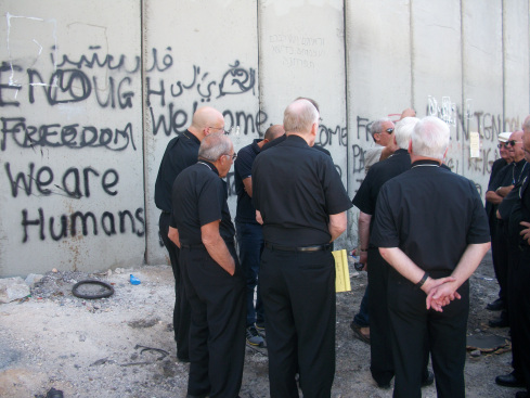 Bishops gather at the Separation Wall in Jerusalem.