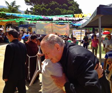 Bishop Pates meets with community members during a meeting in Guatemala on the effects of mining.