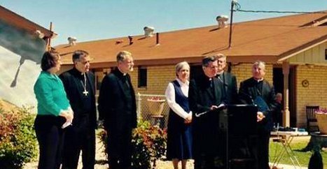 Archbishop Garcia-Siller calls for an end to immigrant family detention during a press conference in Dilley, Texas.